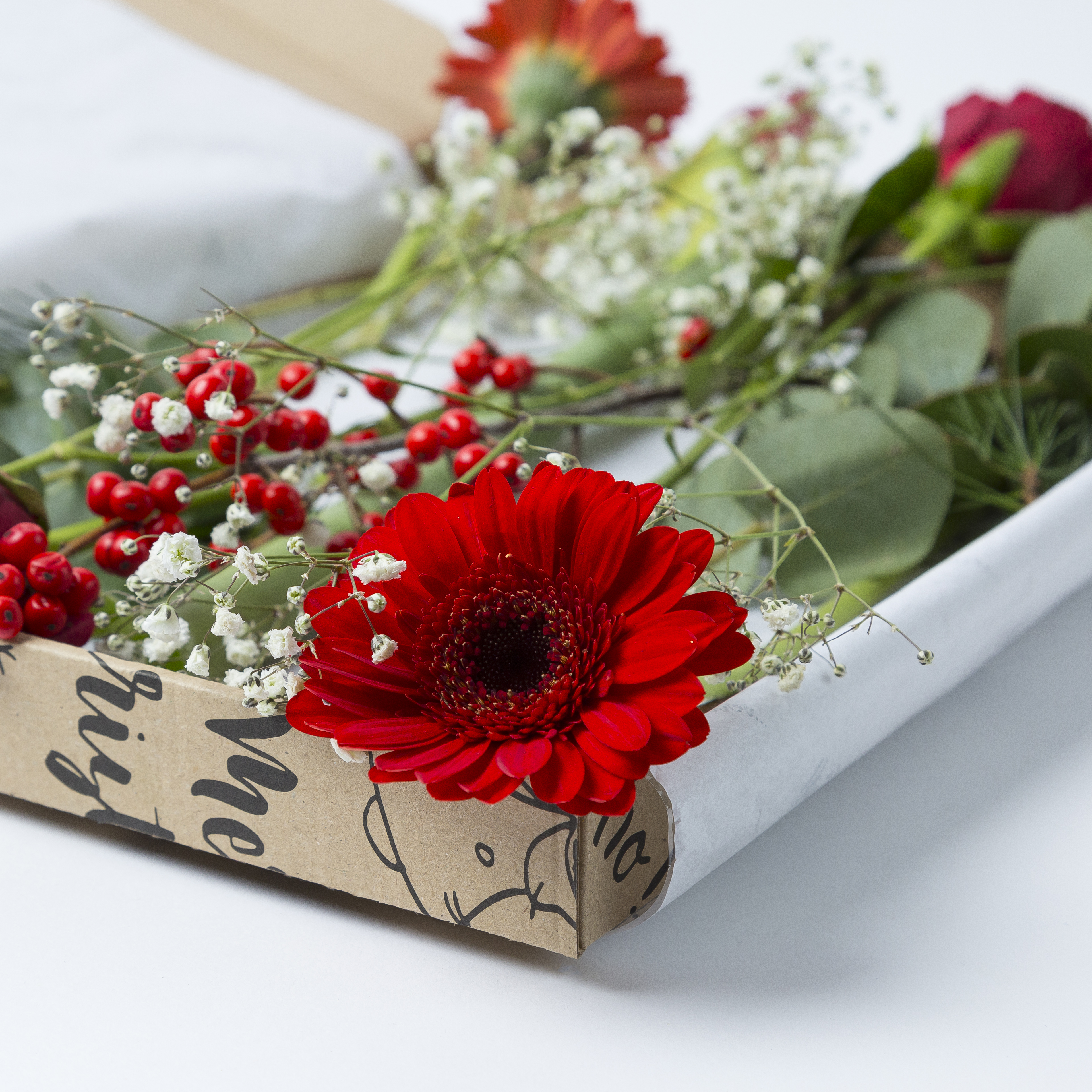 Kerst brievenbusbloemen