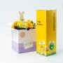 Paasbloemstuk met M&M's Pasen cadeaupakket